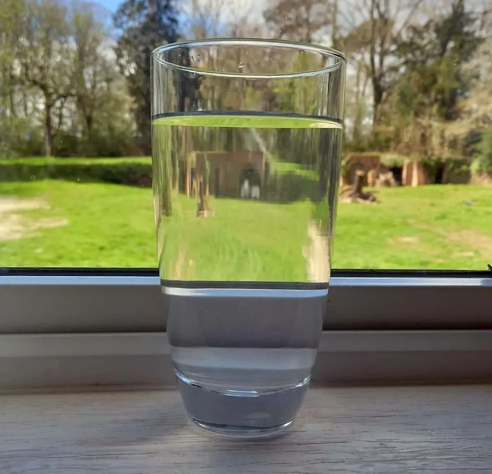 A crystal clear glass of well water