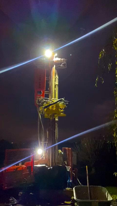 UK borehole drillers attending an emergency situation in the night time.